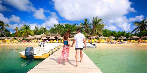 Couple walking on dock in St. Martin