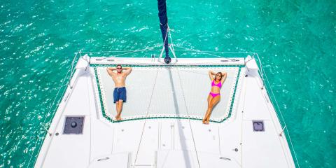 Couple on Moorings 5000 trampoline