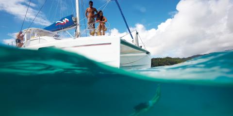 Swimming from catamaran in Tahiti