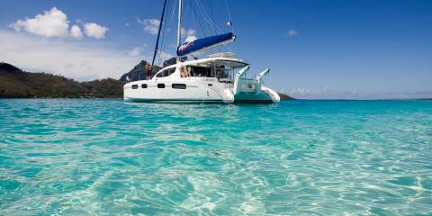 sailing catamaran with dinghy lift