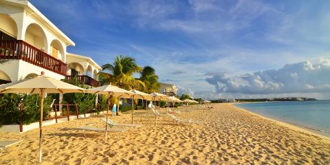 beach umbrellas on empty beach in St. Martin