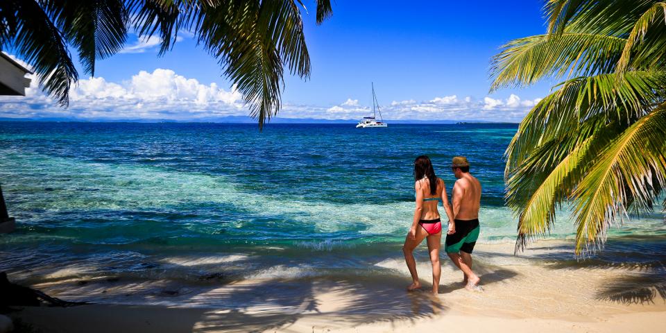 Couple walking on beach Couple walking on beach