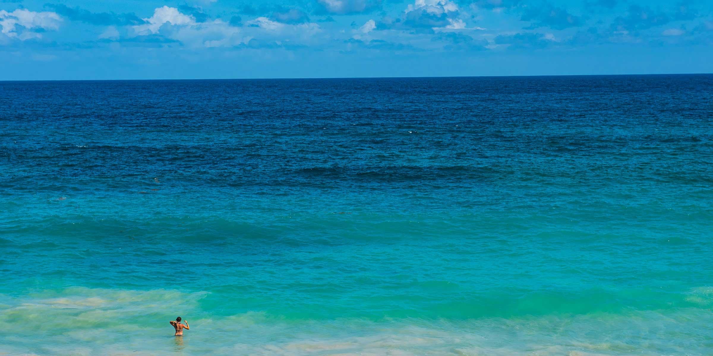 Woman Standing in the Ocean in St Martin